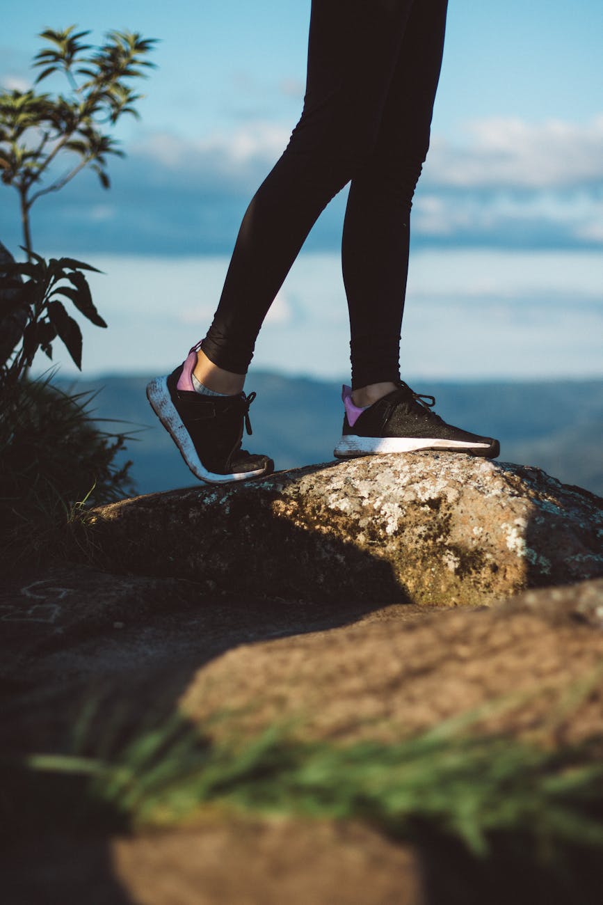 person standing on rock